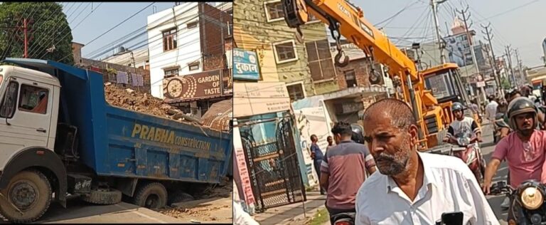गीता वाटिका के सामने बैक करते समय नाले में गिरा डंपर, भारी जाम से शहरवासियों को परेशानी